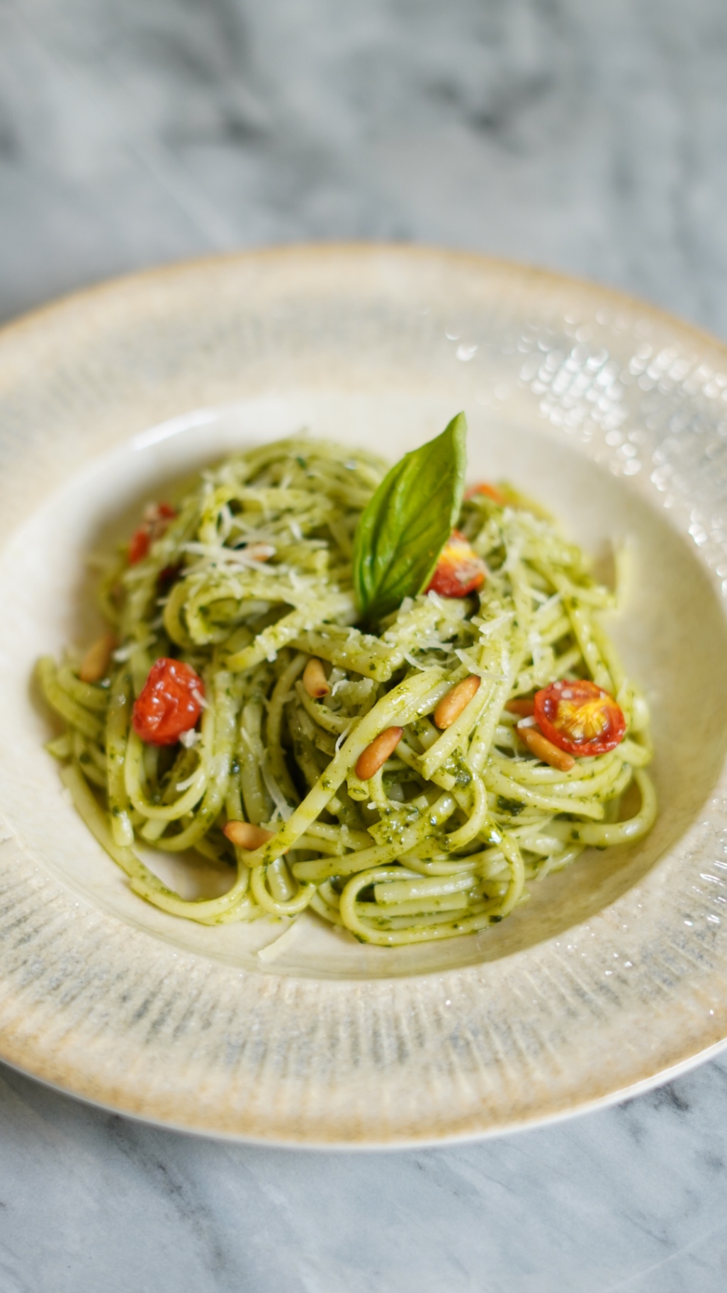 Linguine with Genovese pesto, cherry tomatoes, pine nuts and basil